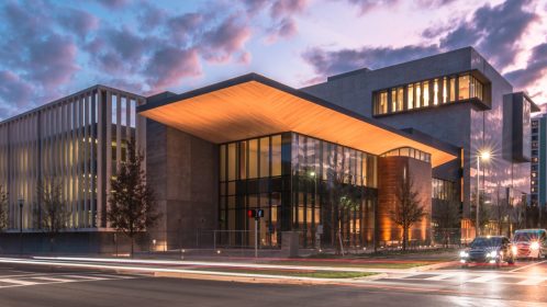 glazed office building by night