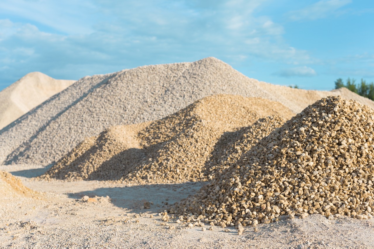 pile of limestone quarry on background of blue sky